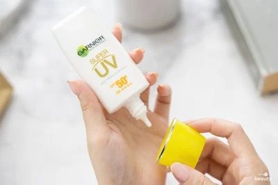 ขั้นตอนที่ 1 - เปิดฝาครีมกันแดดการ์นิเย่